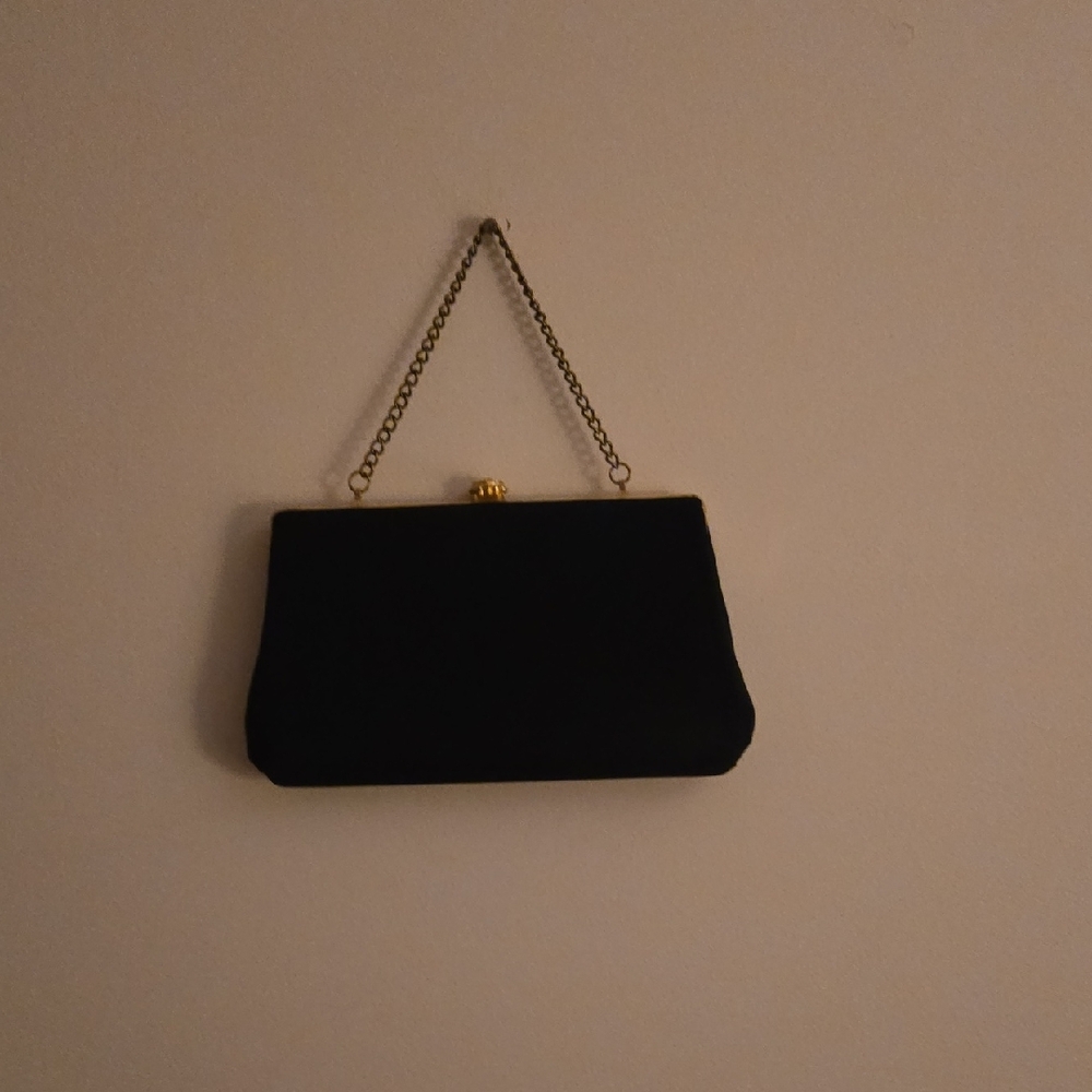 Black Textured Clutch with Chain Strap.
